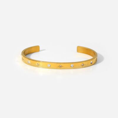 Star stamped Cubic Zirconia bangle in gold.