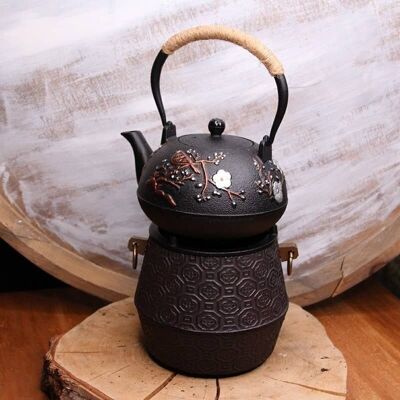 Support for cast iron teapot