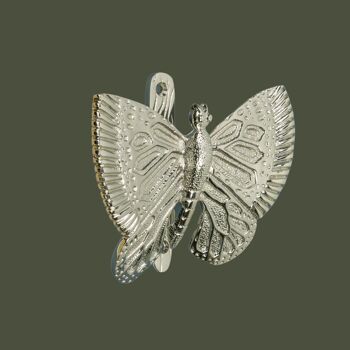 Heurtoir de porte papillon en laiton - fini nickel 1