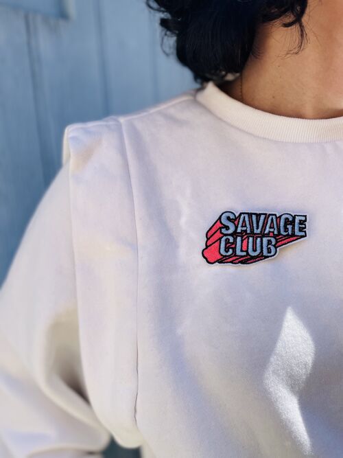 Broche tissée Savage Club