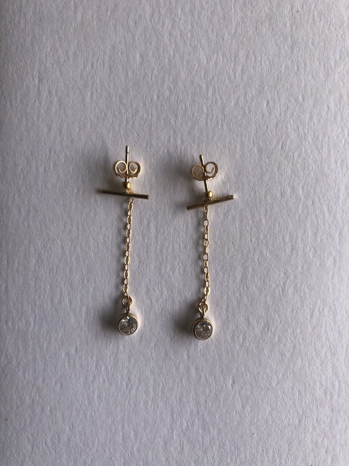 Orecchini “Le Diamant” in oro placcato e zirconio