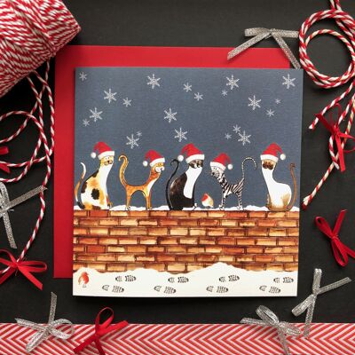 Cartolina di Natale con gatti sul muro