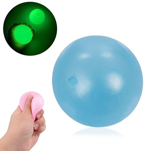 Bola de silicona antiestrés de 5,5cm, brilla en la oscuridad. Bola blanda para apretar y estrujar. Pegajosa, se pega en techo y paredes durante unos segundos. Azul