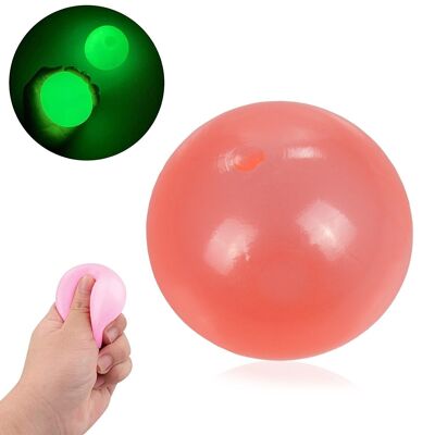 Boule en silicone anti-stress de 5,5 cm, brille dans le noir. Balle molle pour presser et presser. Collant, il se colle au plafond et aux murs pendant quelques secondes. Rouge