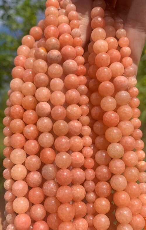 Perles en calcite orange entre 6 et 8mm - 6mm