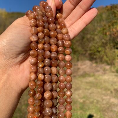Perles en pierre de soleil entre 6 et 8mm - 6mm