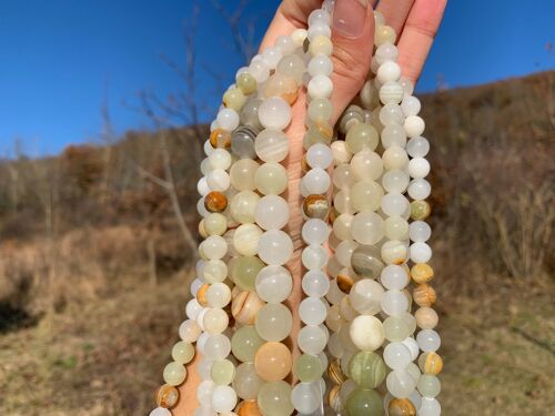 Perles en aragonite entre 8 et 12mm - 12mm
