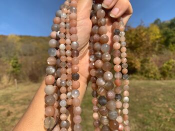 Perles en pierre de lune multicolore facettée entre 6 et 10mm - 8mm