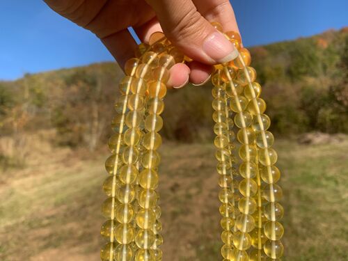 Perles en fluorite jaune entre 6 et 10mm - 12mm (Sur commande)