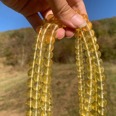 Perles en fluorite jaune entre 6 et 10mm - 12mm (Sur commande)