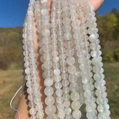 Perles en pierre de lune blanche entre 6 et 10mm - 8mm