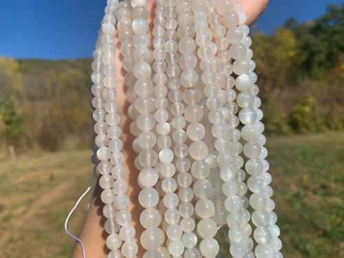 Perles en pierre de lune blanche entre 6 et 10mm - 10mm