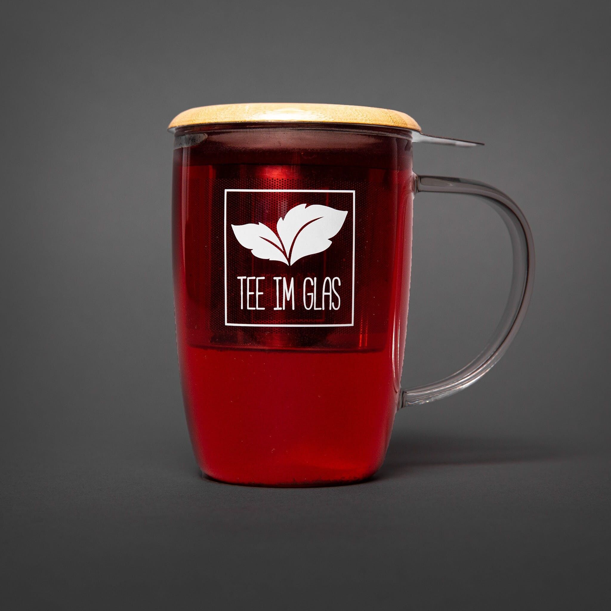 Taza de té con colador