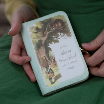Monedero Alice turquesa con cremallera alrededor del libro