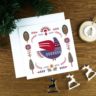 Biglietto natalizio con arte popolare nordica: la colomba viola.
