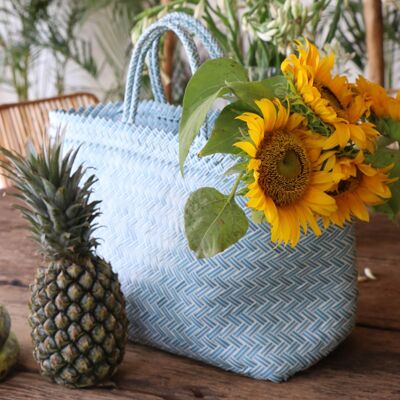 Blue woven basket with small handle