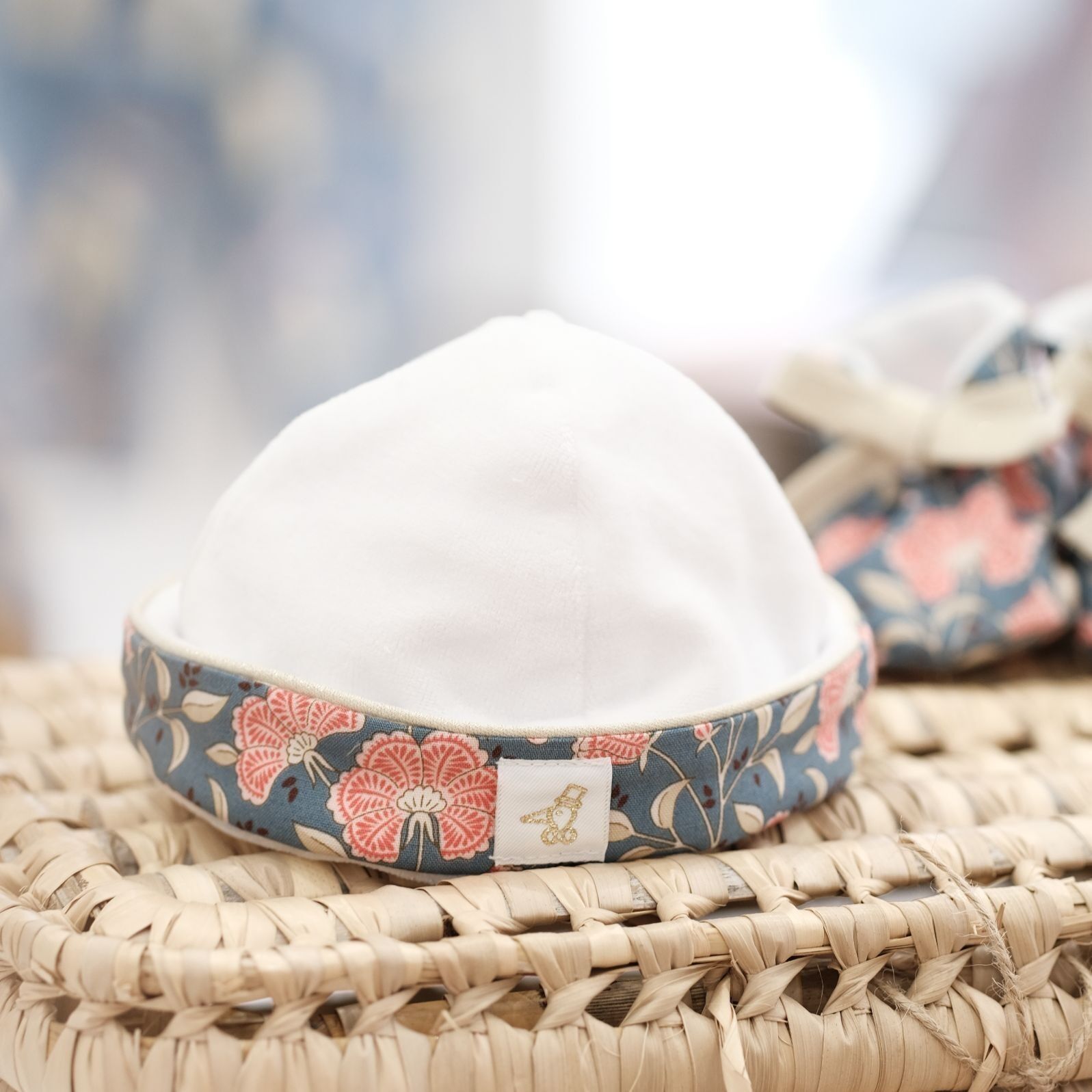 Cappello premaman con papavero dorato