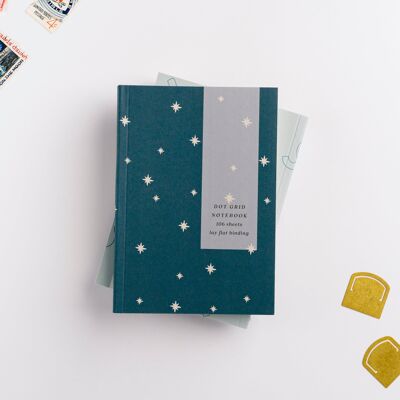 Cuaderno delgado A6 con diseño de estrellas verde azulado
