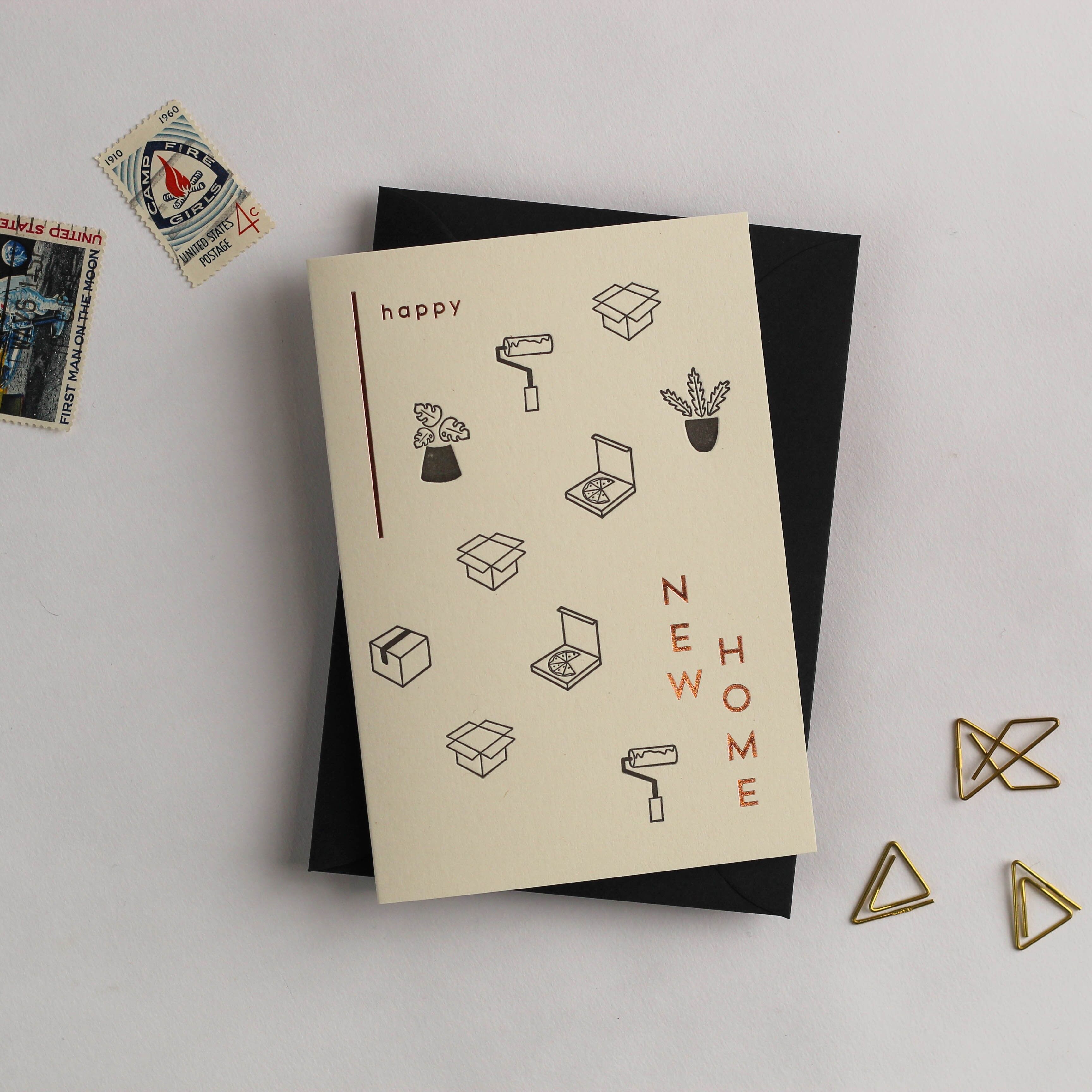 Carta della tazza di caffè riciclata della nuova casa felice