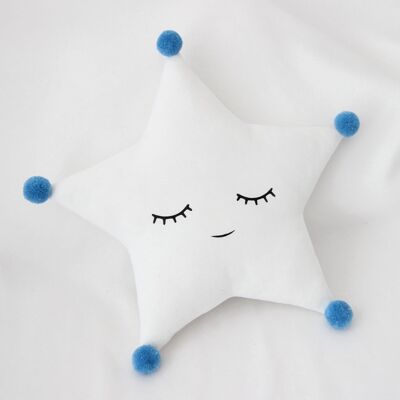 Cuscino a stella bianca assonnato con pompon blu