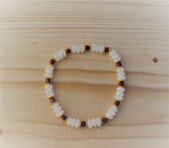 Bracelet de pierres précieuses en cristal de roche craquelé et cube de rubis