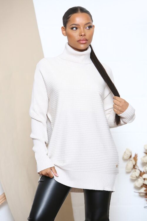Beige ribbed jumper with heart bead