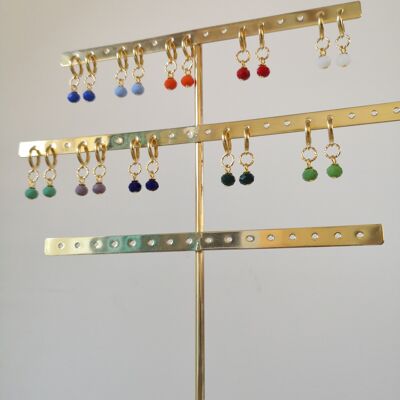 Collection of set of 10 golden mini hoop earrings and colored pearls. winter collection.