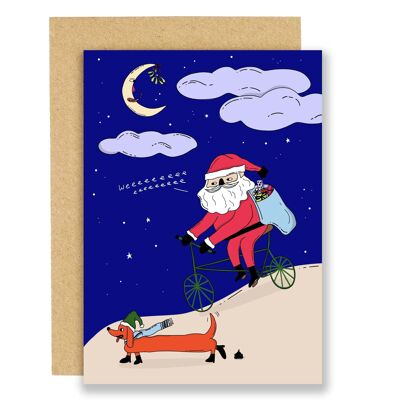 Weihnachtskarte - Weihnachtsmann auf einem Fahrrad