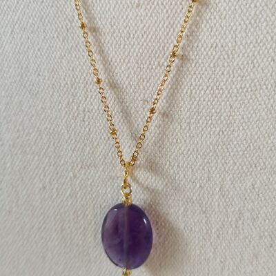 Maud necklace, with its cut amethyst stone, purple color. winter collection.