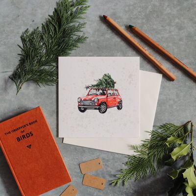 Cartolina d'auguri sostenibile dell'acquerello dell'automobile di Natale