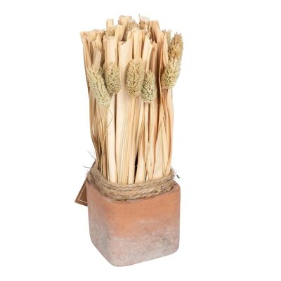 Soffici bouquet di erba secca in vaso di terracotta