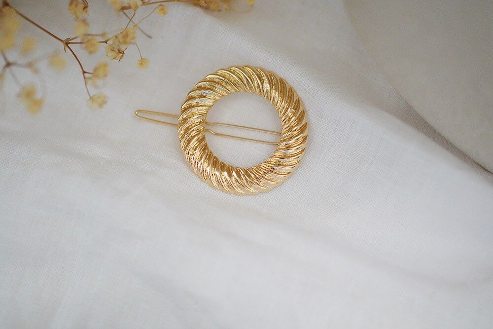 Selena fermagli tondi in oro