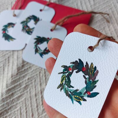 Tags for Christmas gifts with handmade watercolor illustration