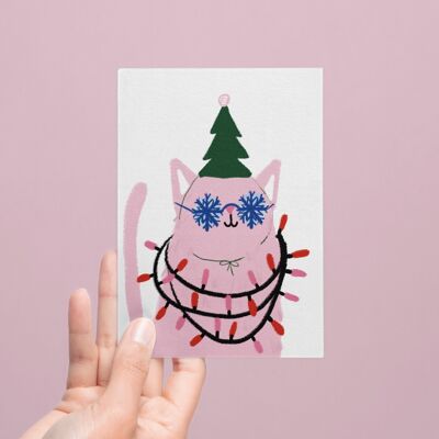 Tarjeta de felicitación navideña con ilustración de gato rosa