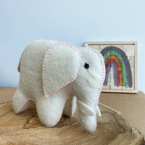 Éléphant blanc et rose en laine feutrée
