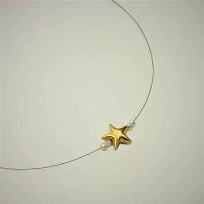 Necklace with a star and dainty freshwater pearls