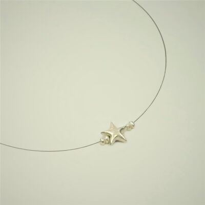 Necklace with a star and dainty freshwater pearls