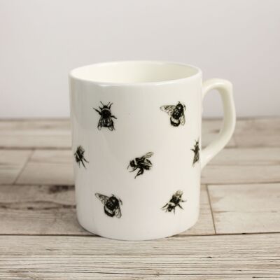 Taza de porcelana de abejas negra impresa a mano