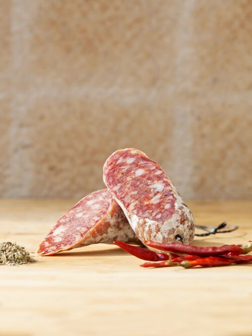 Dried-cured sausage with chili and oregano