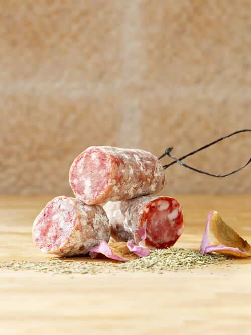 Dried-cured sausage with rosemary and rose pettals