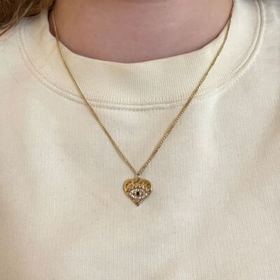 Heart plate steel necklace with rhinestone eye