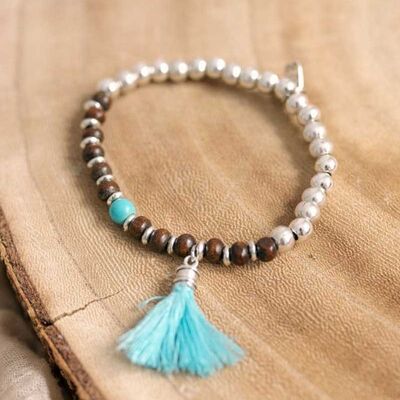 Pulsera pompon turquesa
