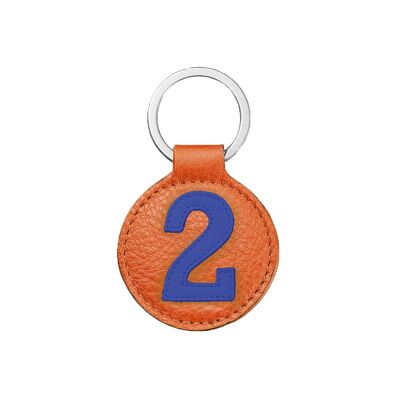 Schlüsselanhänger blau Nummer 2 auf orangefarbenem Hintergrund / Schlüsselanhänger blau auf orange Nummer 2