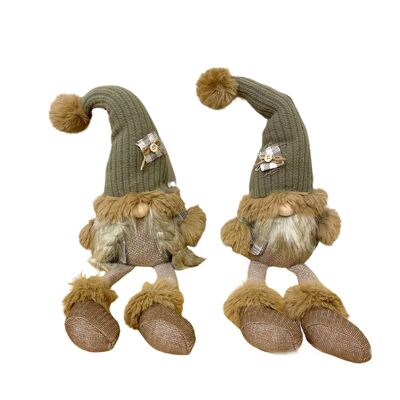 Seduti Mr & Mrs Santa Gonks con le gambe penzolanti