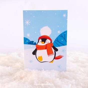 Carte de voeux joyeux Noël avec un pingouin mignon 2