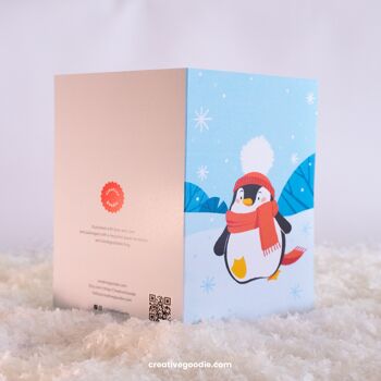 Carte de voeux joyeux Noël avec un pingouin mignon 3
