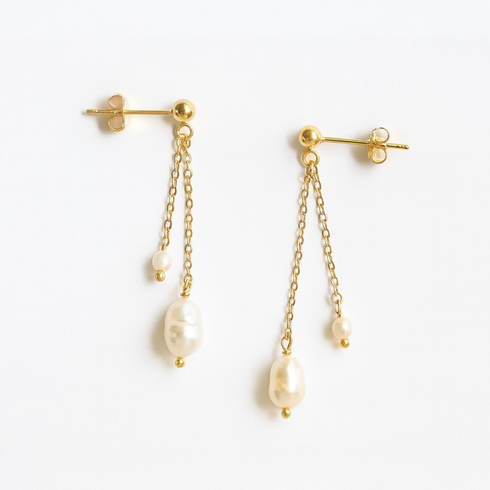 Orecchini di perle pendenti "chicco di riso"