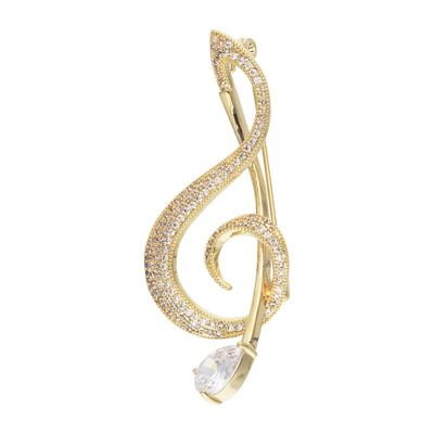Melody yellow gold and zirconia brooch
