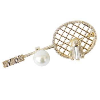 Broche tennis avec zircons et perle