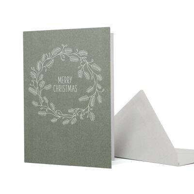 Tarjeta navideña con ramas de abeto "Feliz Navidad" verde hecha de papel 100% reciclado